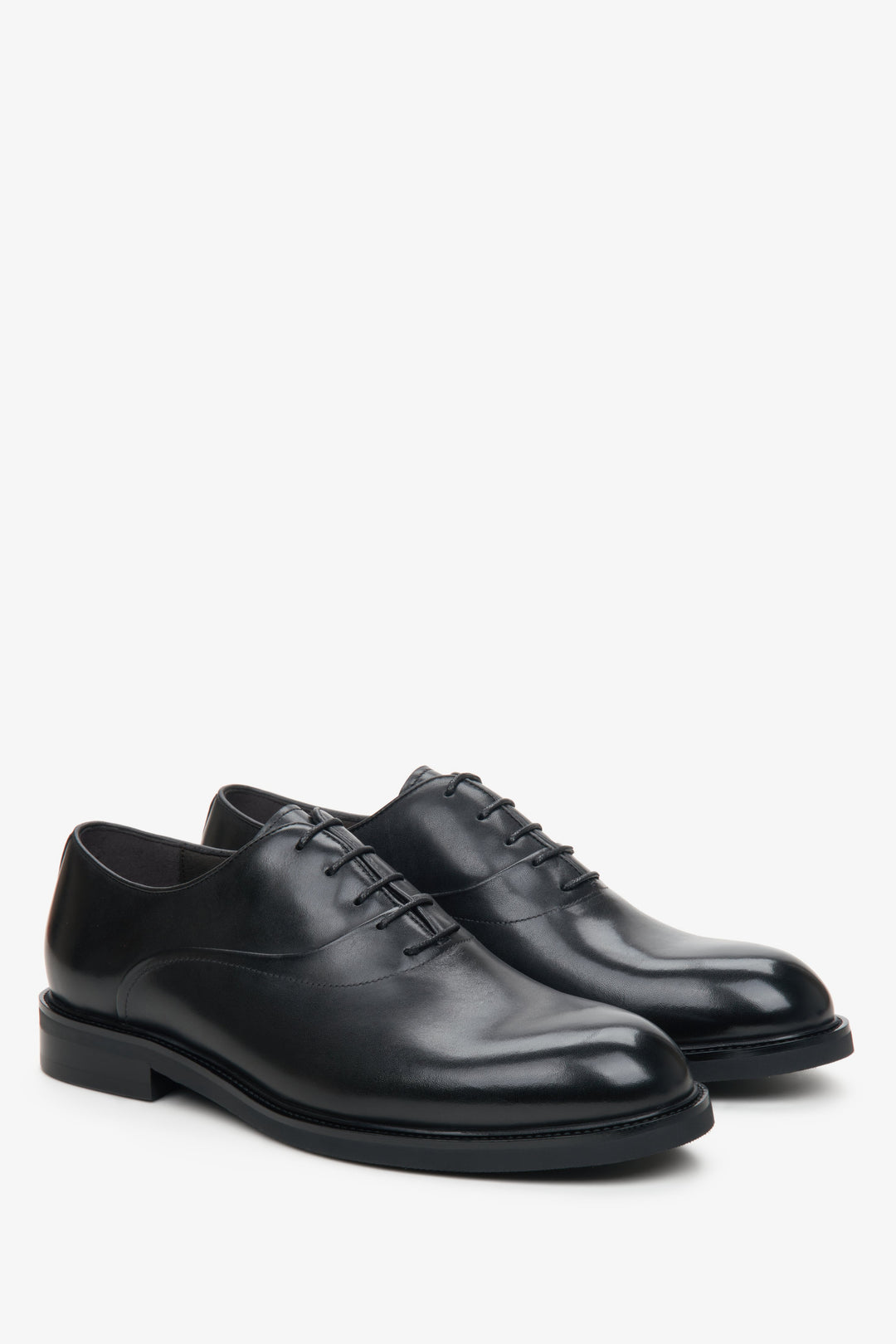 Men's black leather shoes by Estro.
