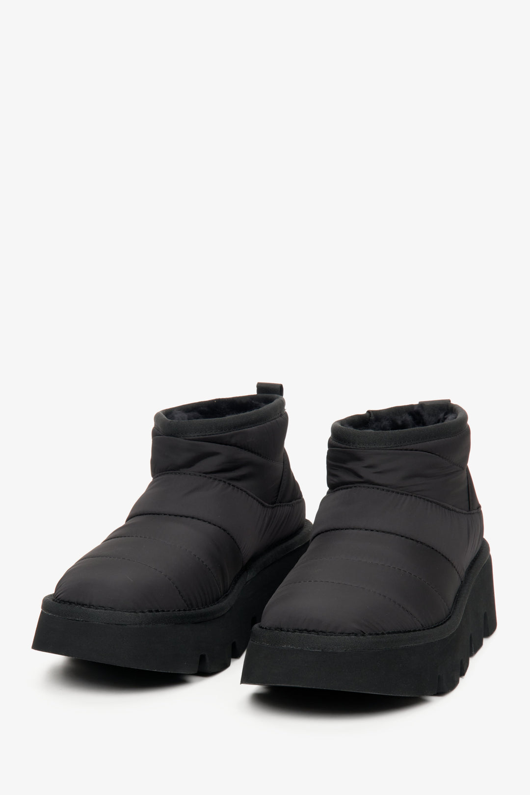 Women's black snow boots by Estro for winter.