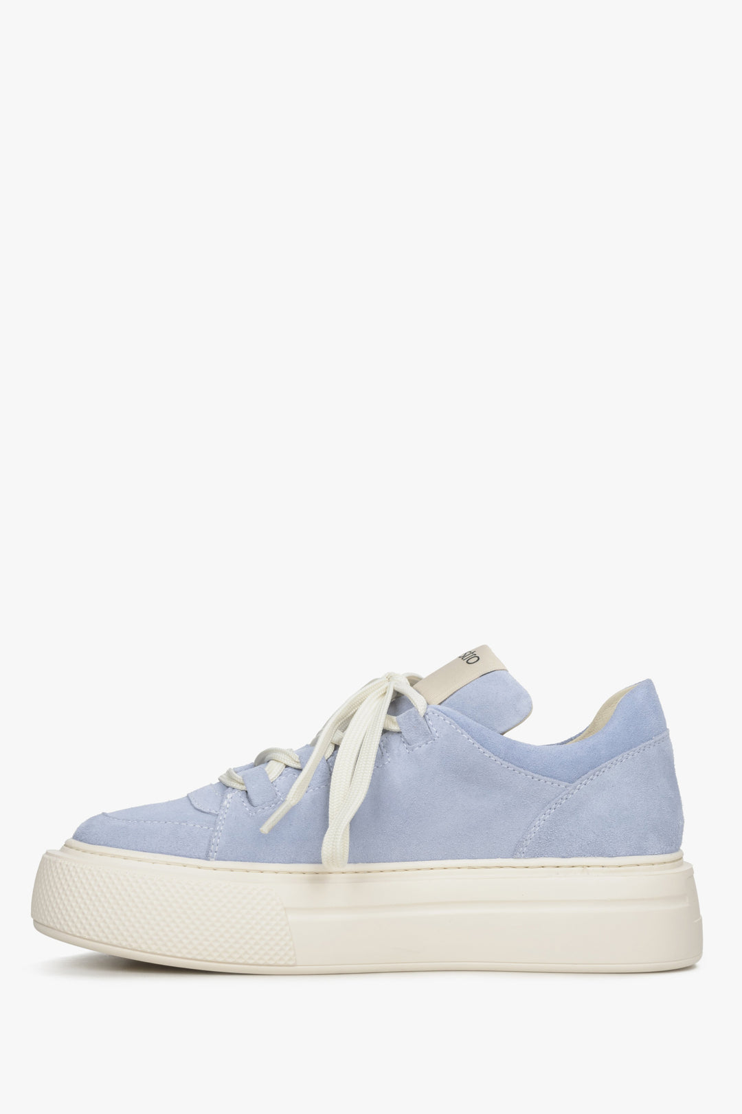Women's blue sneakers on a thick sole - shoe profile.