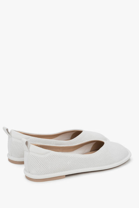 Women's white ballet flats by Estro, made of perforated soft genuine velour – close-up of the heel counter.