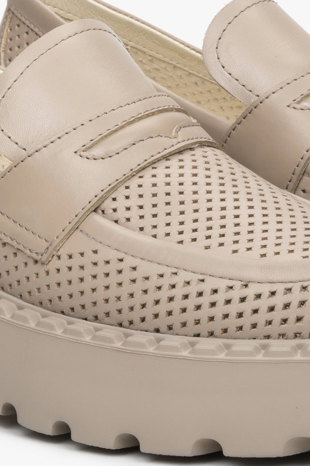 Women's leather loafers for summer in beige color, brand Estro - close-up on the stitching system and perforation.