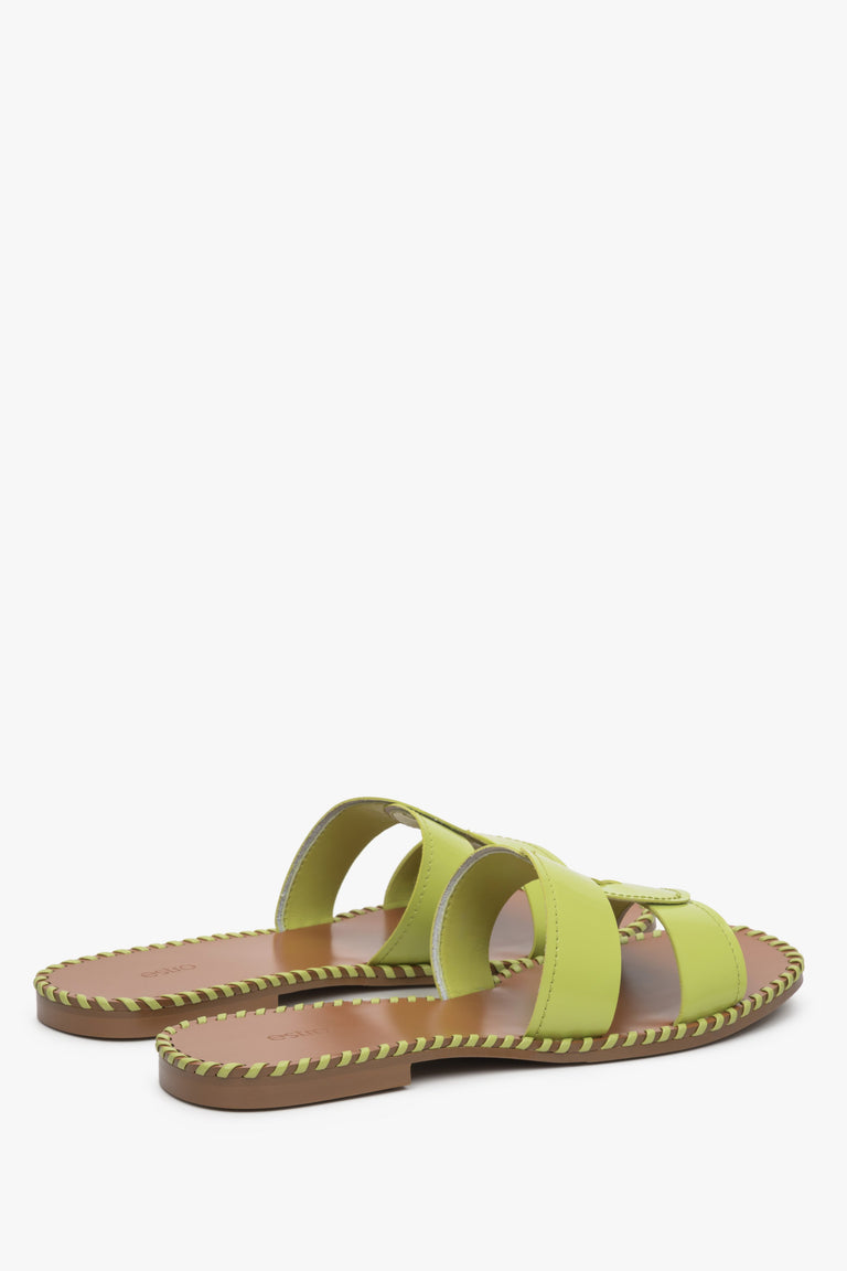 Women's green leather slide sandals.