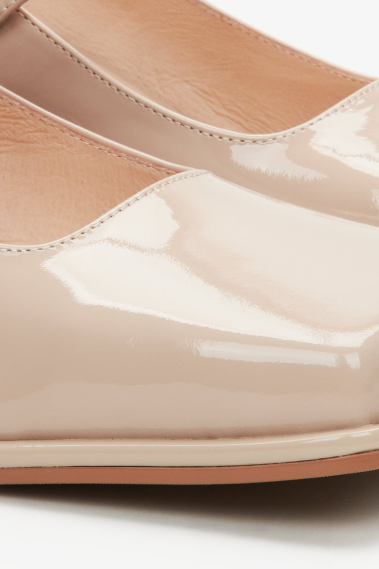 Women's beige leather Mary Jane pumps - close-up on details.