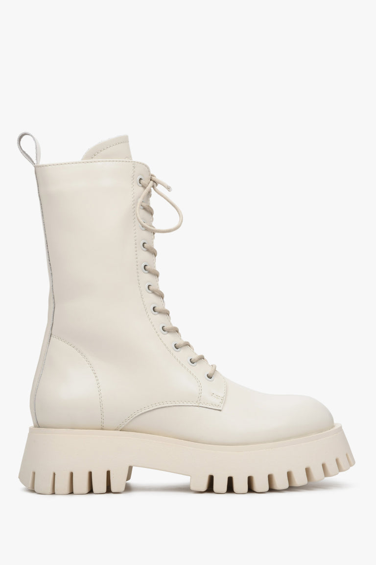 High, white leather women's lace-up boots by Estro - shoe profile.