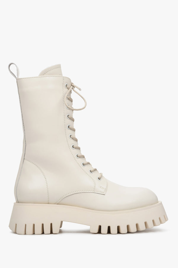 High, white leather women's lace-up boots by Estro - shoe profile.