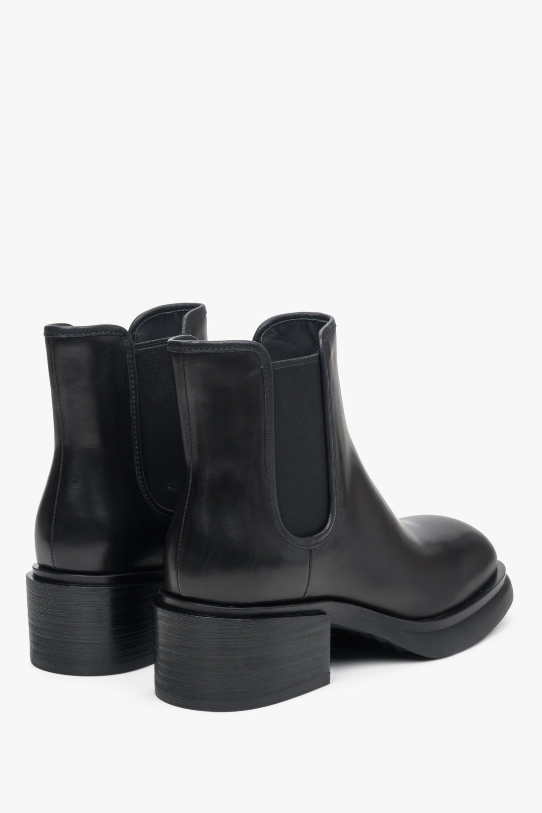 Women's black leather ankle boots Estro - a cose-up on a heel counter.
