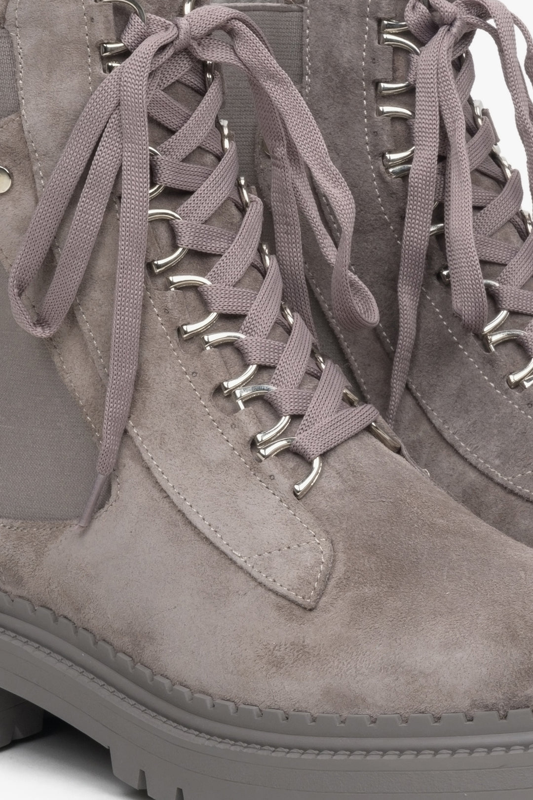 Women's grey lace-up ankle boots - a close-up on details.