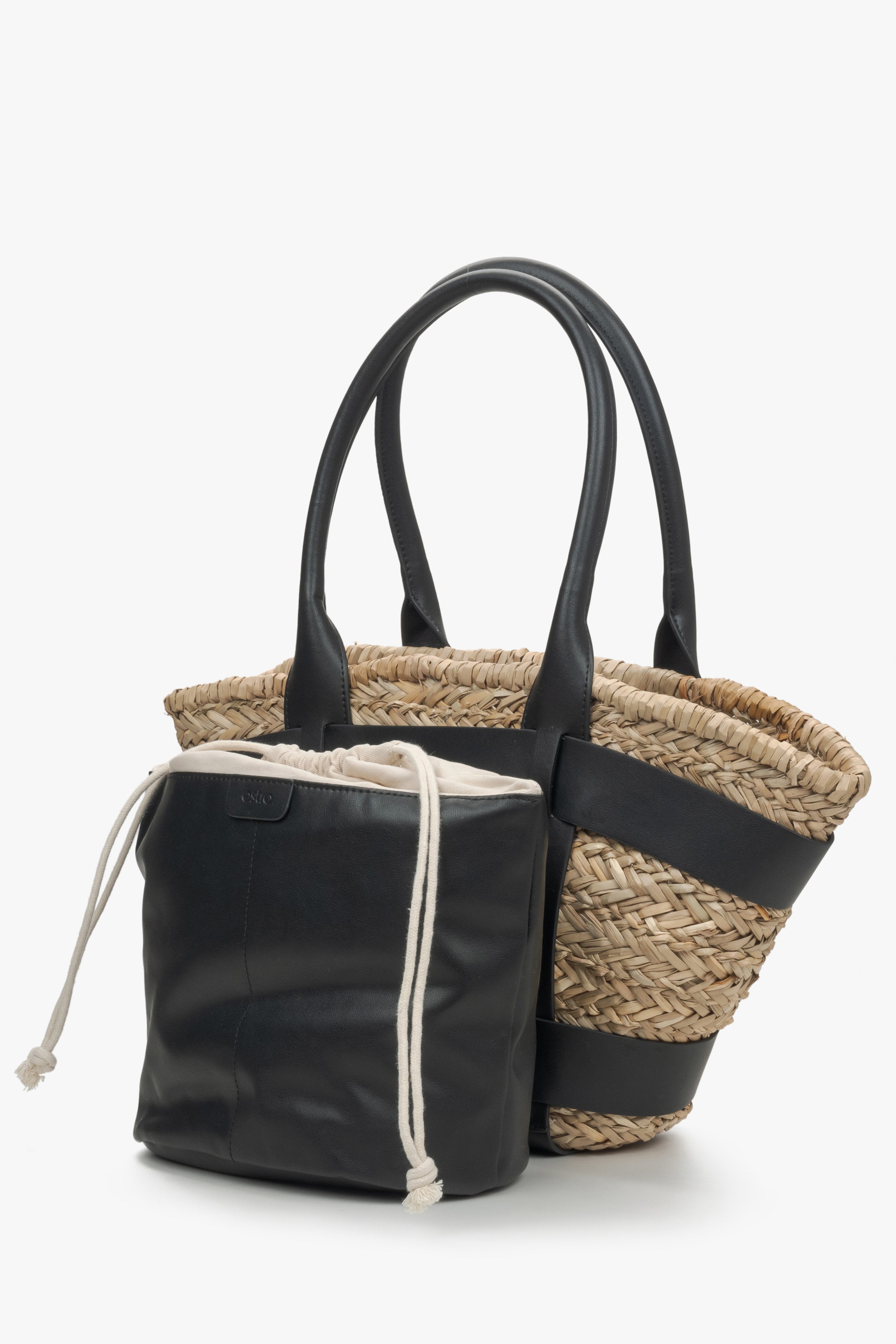 Women's black straw woven shopper bag by Estro.