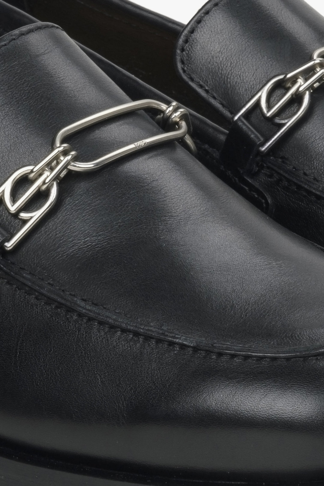Black leather women's penny loafers Estro - a close-up on details.