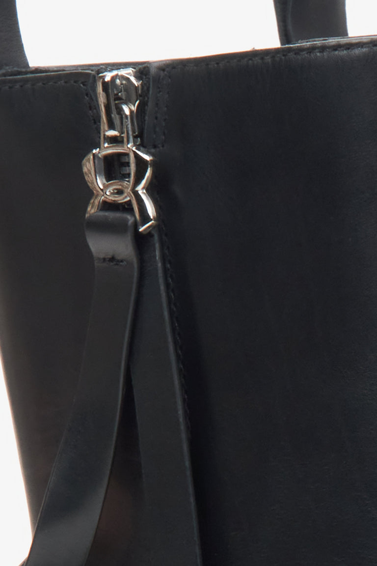 Women's black leather boots by Estro - close-up on details.