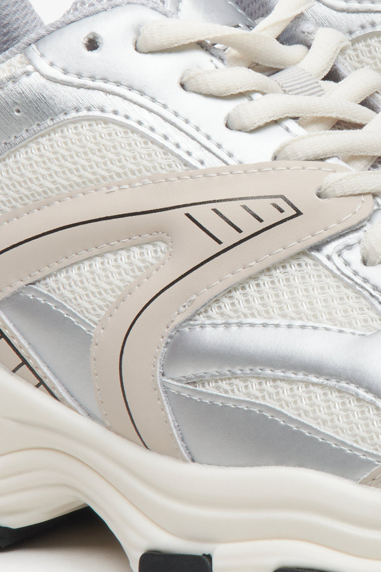 ES8 women's sporty sneakers in light beige-silver color - close-up on the details.