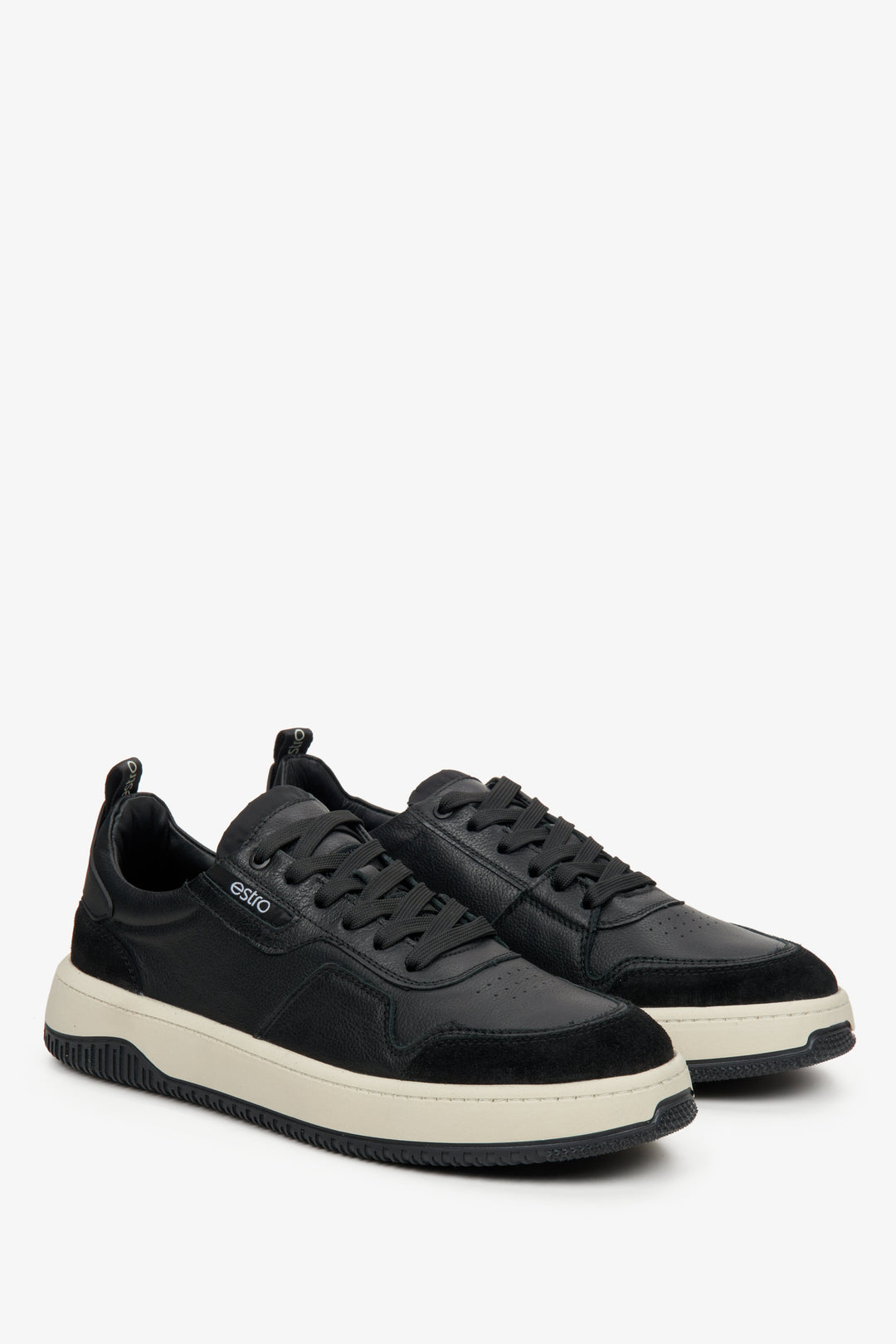 Men's black low-top sneakers made with leather and velour.
