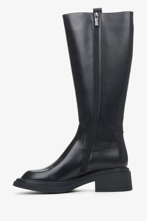 Women's black leather boots by Estro - shoe profile.