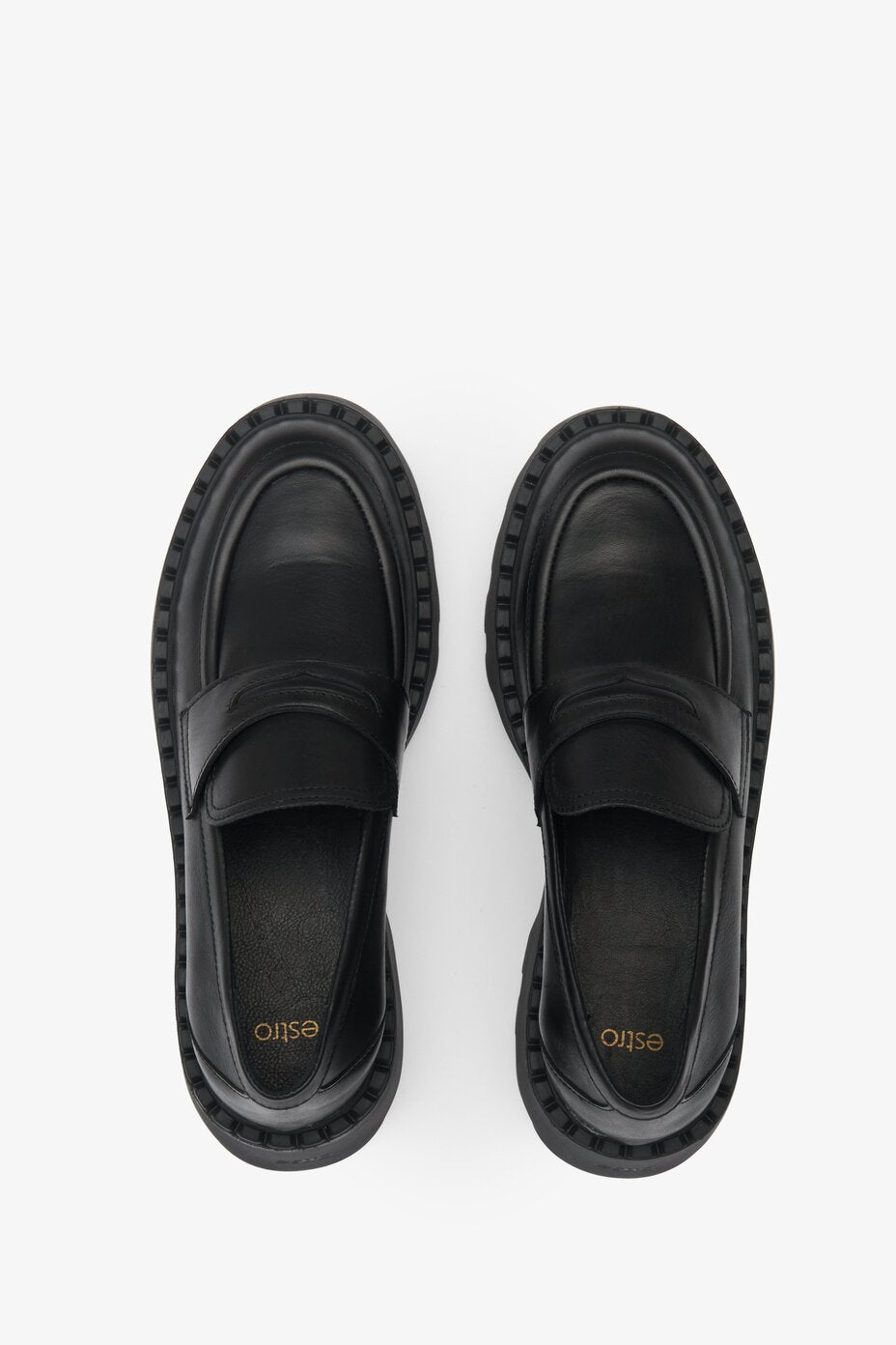 Women's black leather loafers by Estro.