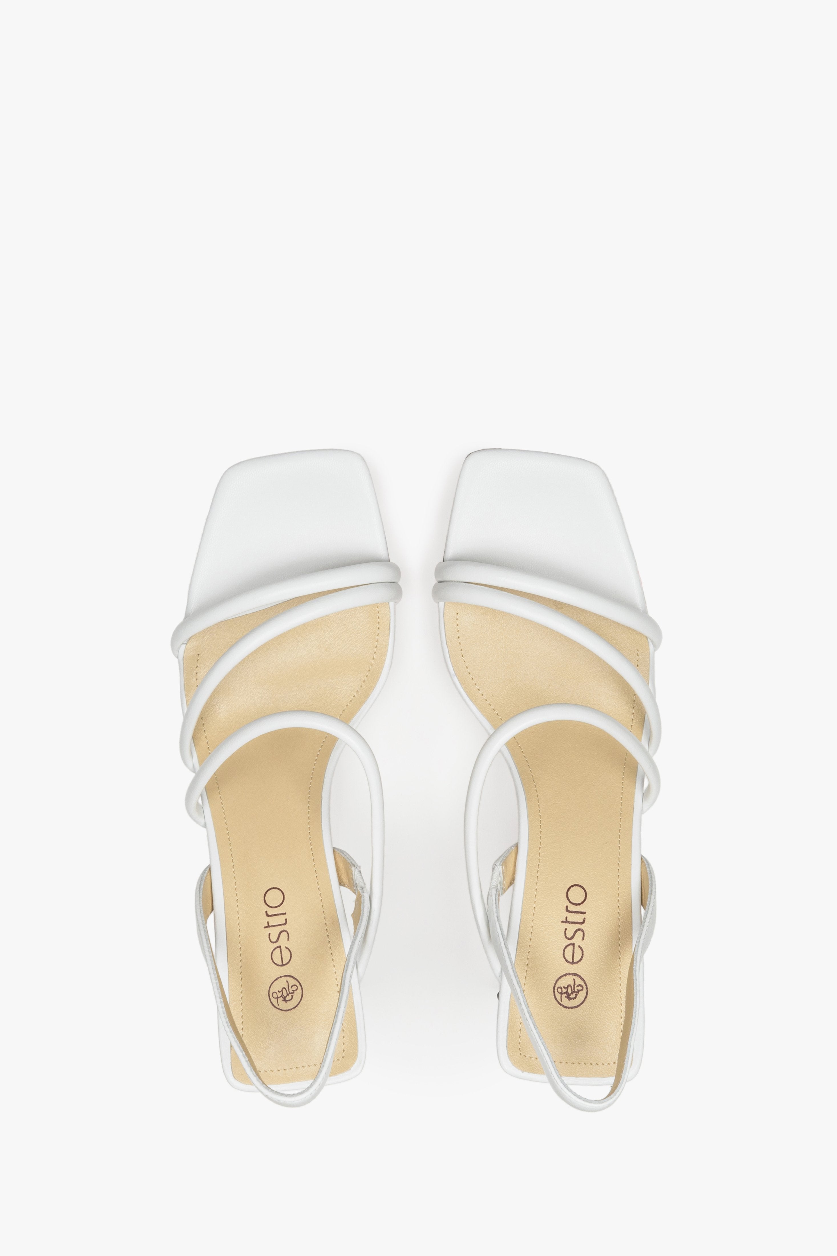 Women's white strappy sandals made of natural leather, Estro brand - presentation of the footwear from above.