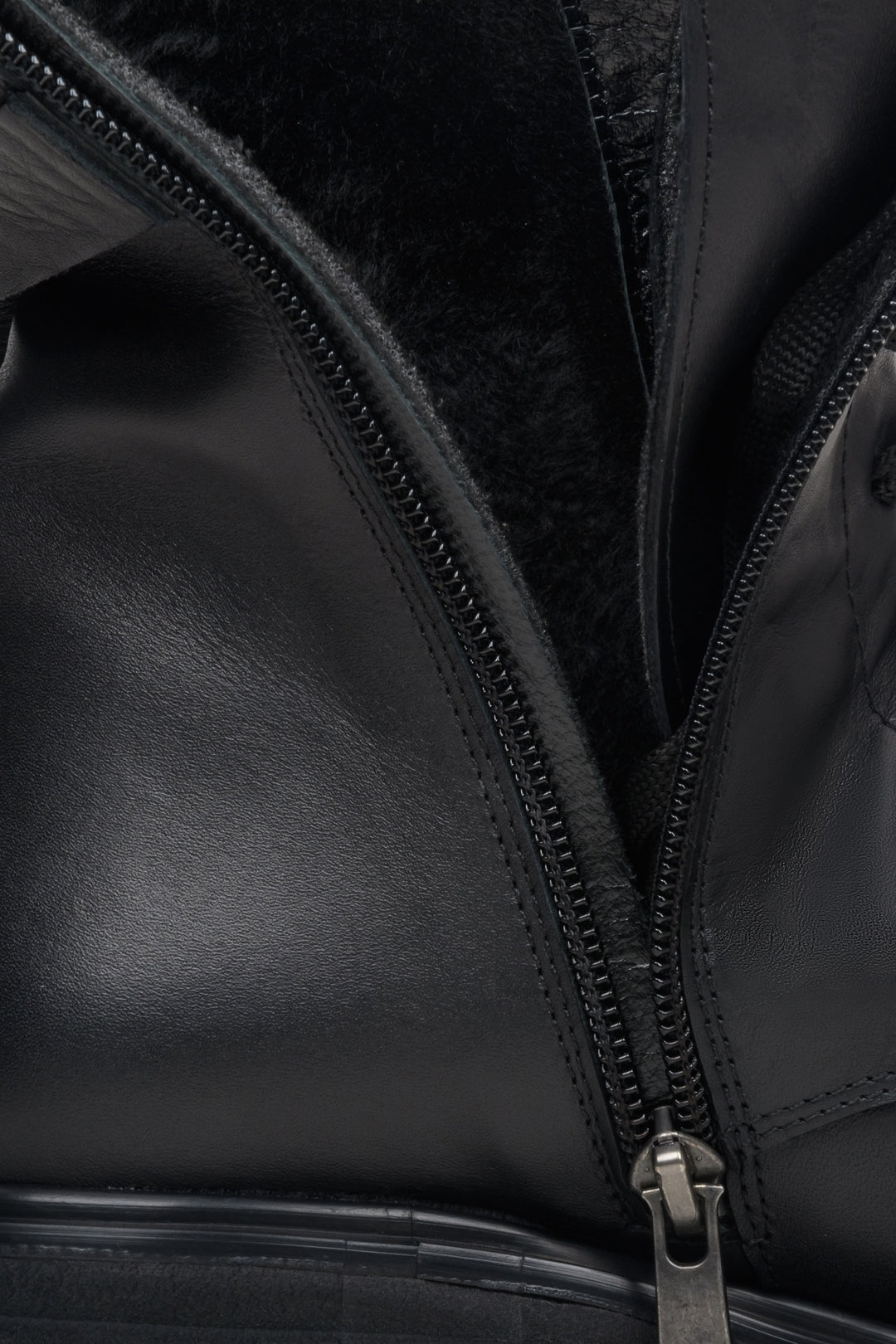 Women's black leather boots by Estro - close-up on the interior.