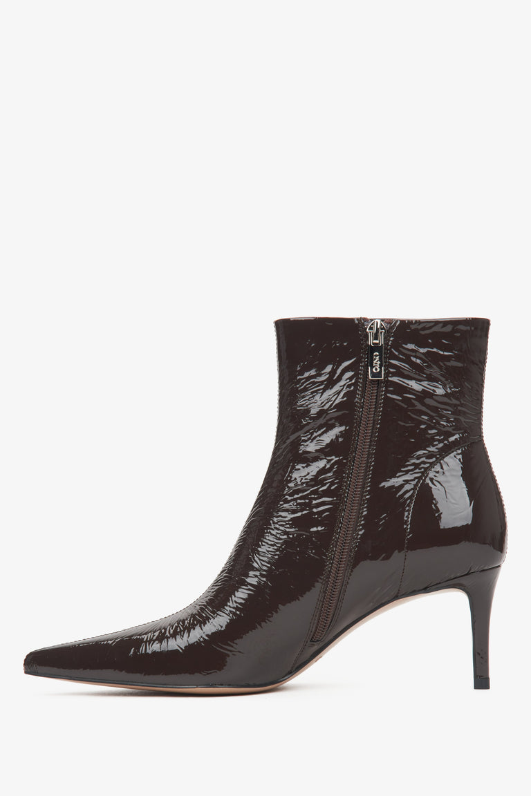 Dark brown leather women's ankle boots on a stiletto heel by Estro – side profile of the shoe.