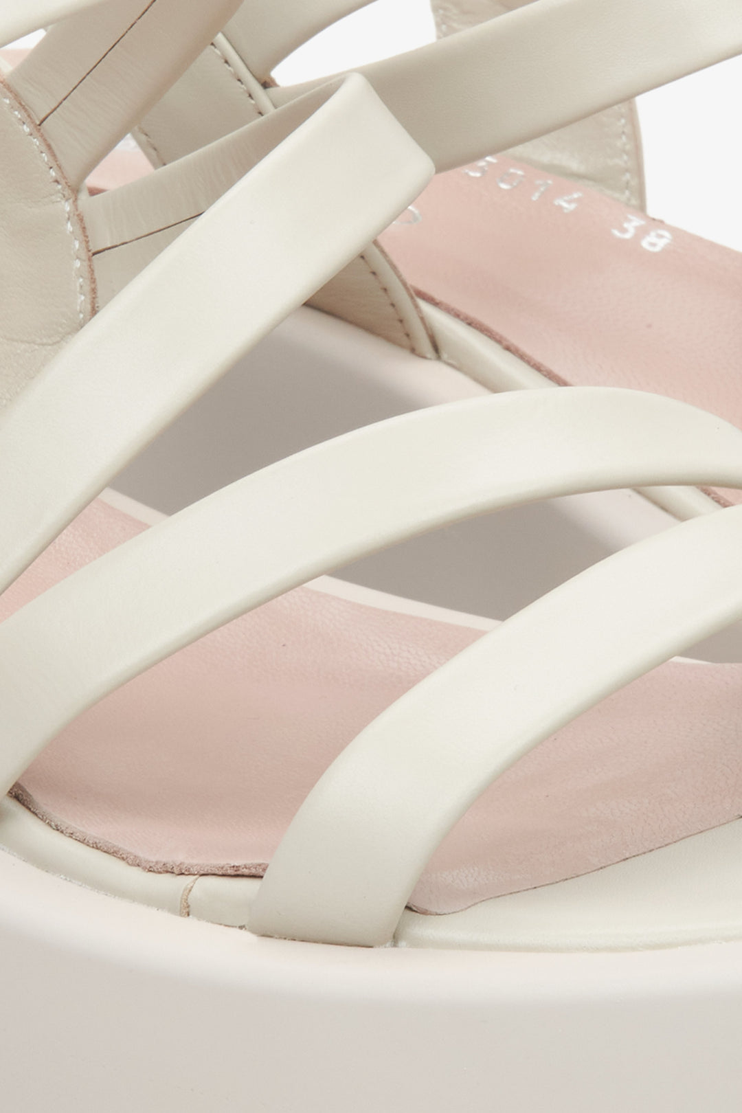 Women's leather light beige sandals by Estro - close-up on the detail.