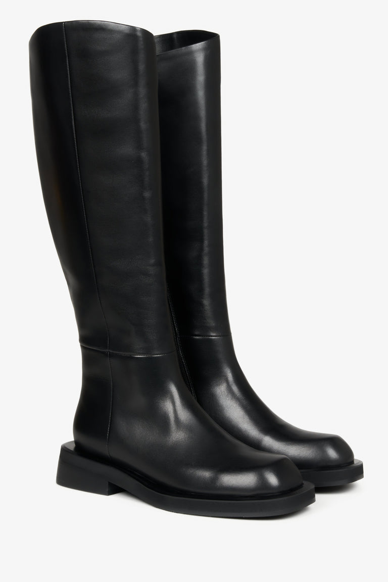 Elevated women's black ankle boots in genuine leather with insulation.