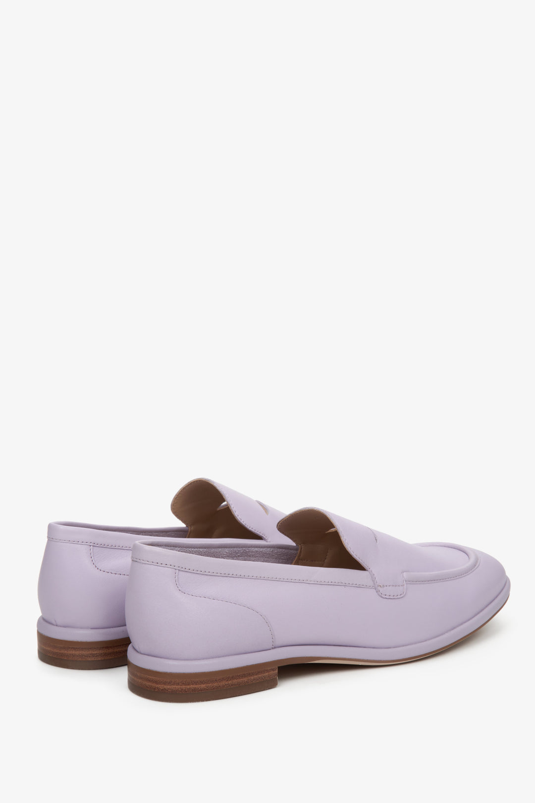 Purple, leather women's moccasins by Estro - close-up on the side vamp and heel.