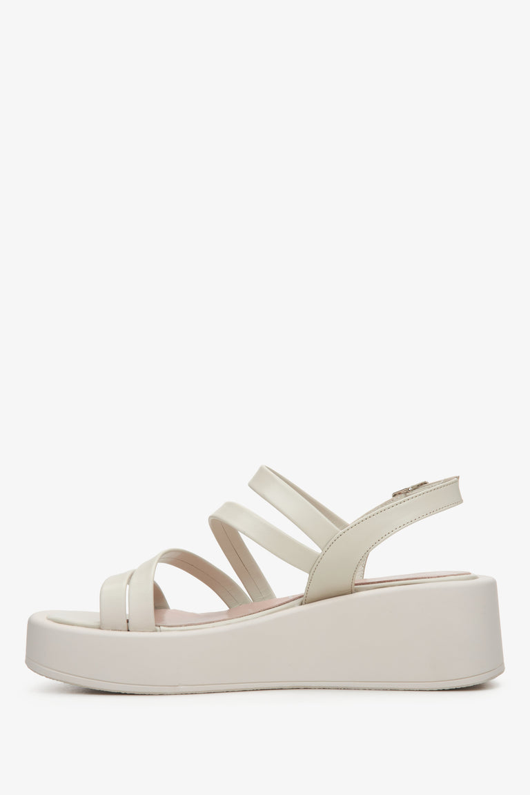 Women's leather light beige wedge sandals by Estro - shoe profile.