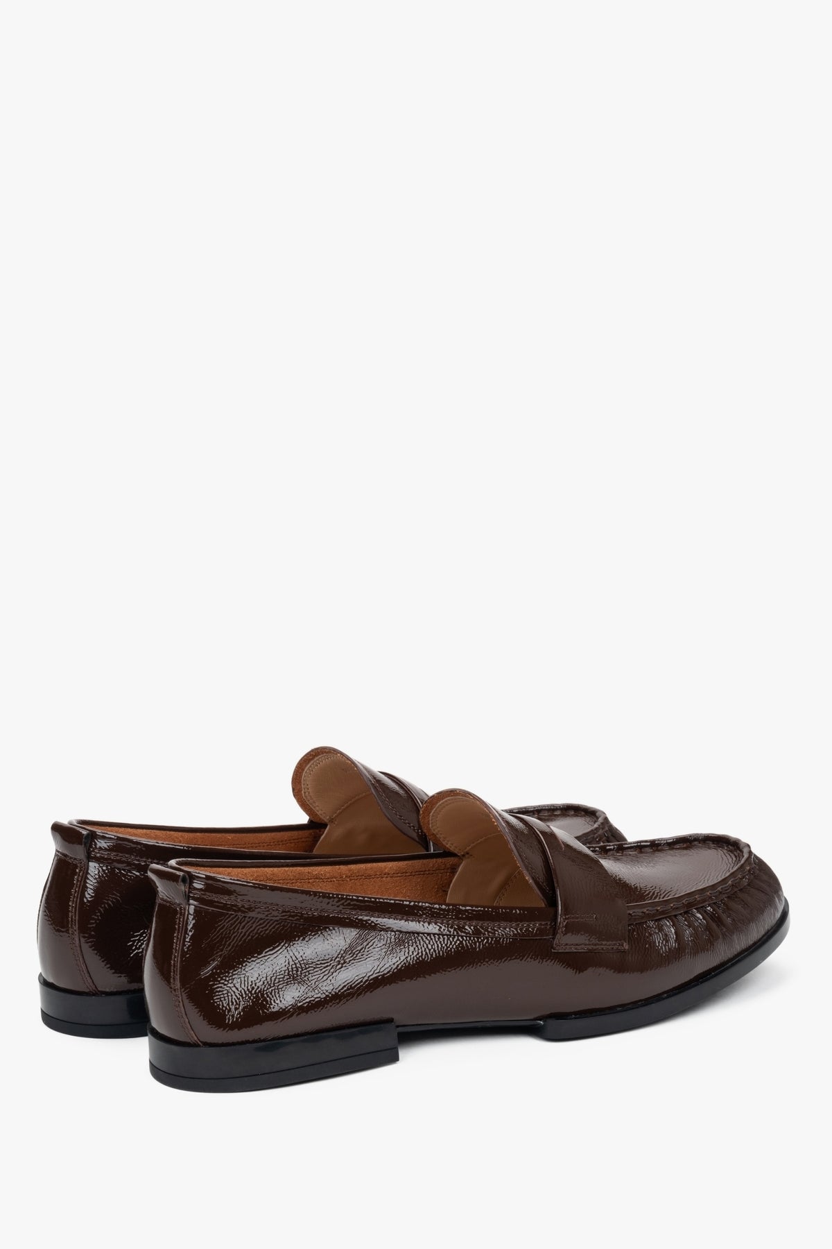 Patent leather women's loafers by Estro in a shade of dark brown.