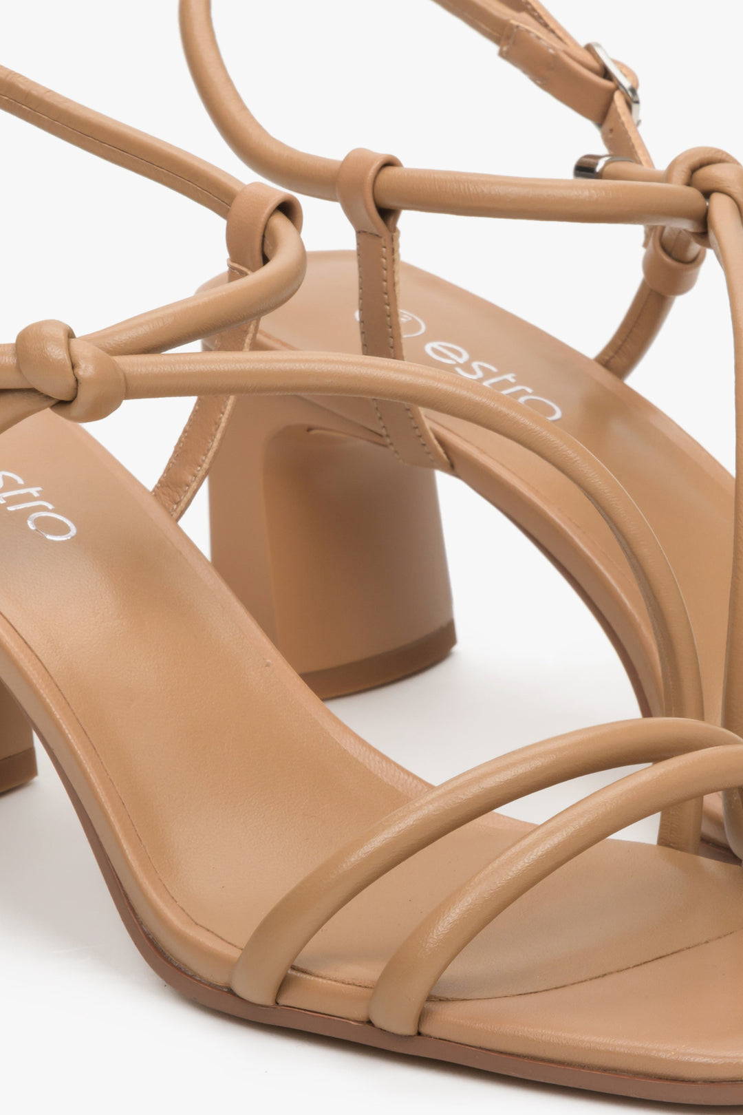 Leather strappy light brown sandals of Estro brand - a close-up on details.