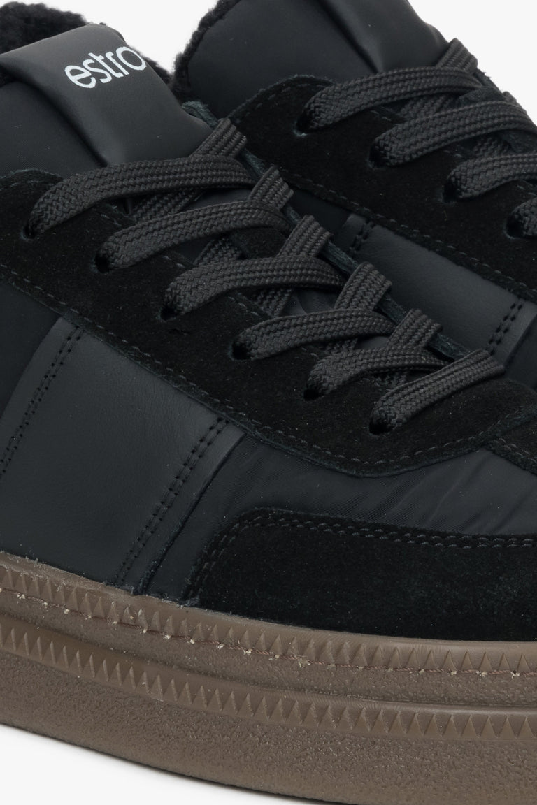 Women's black winter sneakers by Estro - close-up on details.