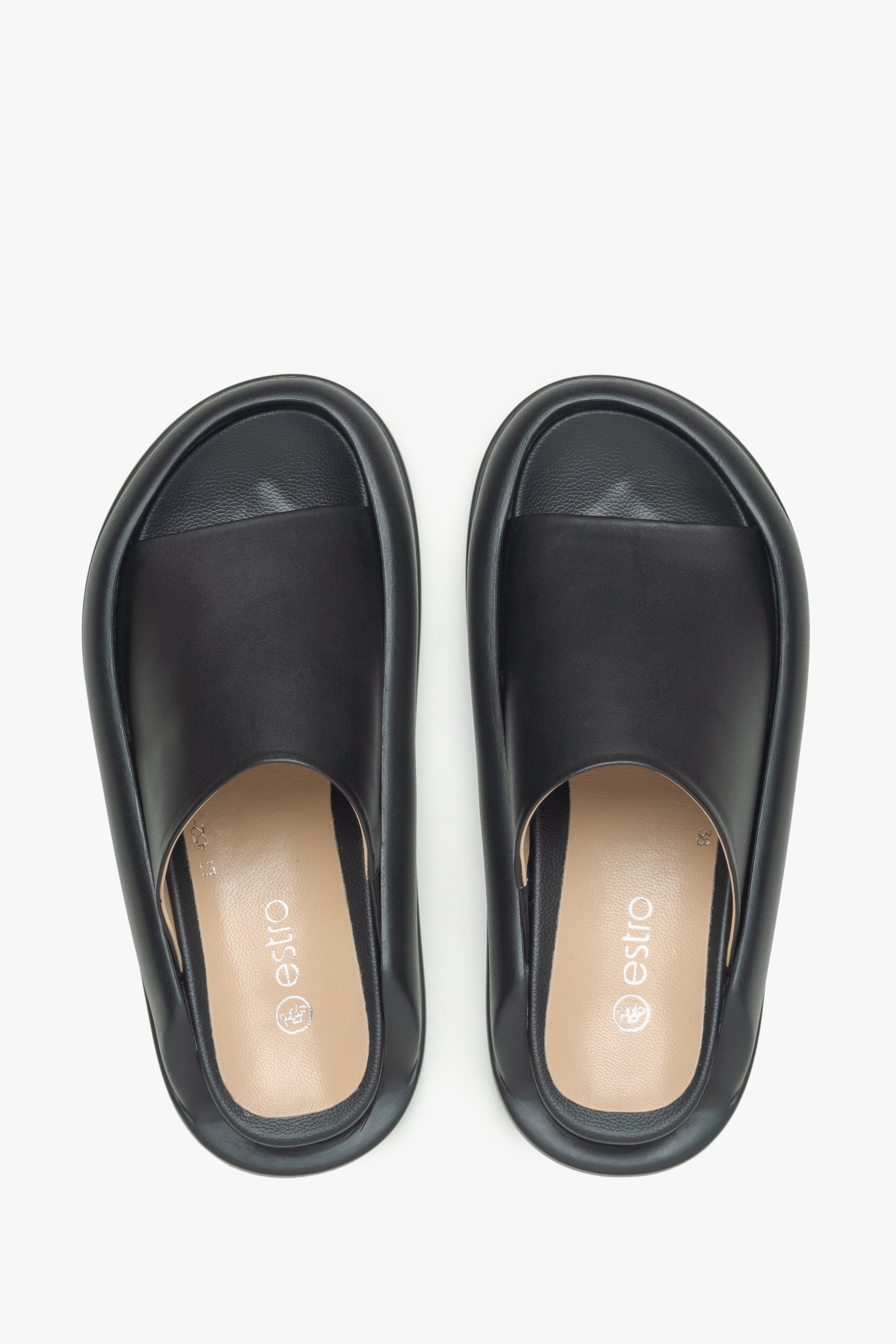 Soft women's black slide sandals made of genuine leather by Estro.