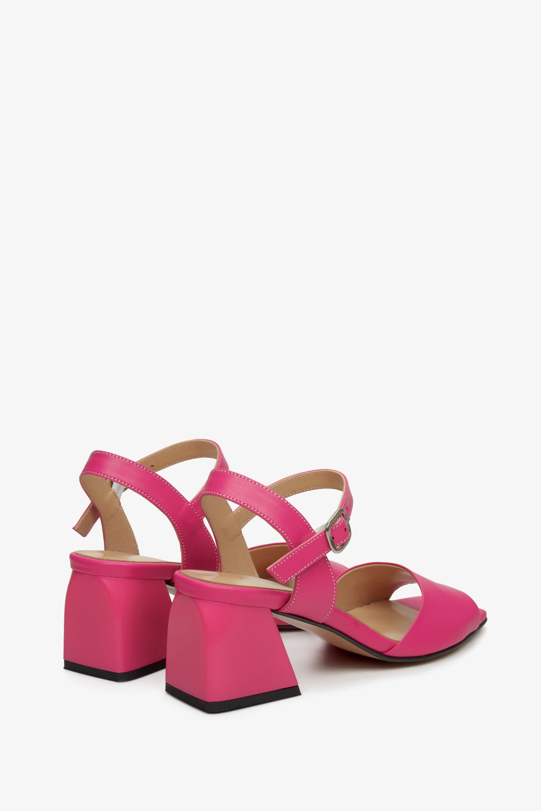 Women's pink leather sandals by Estro - close-up on the block heel and side profile of the shoes.