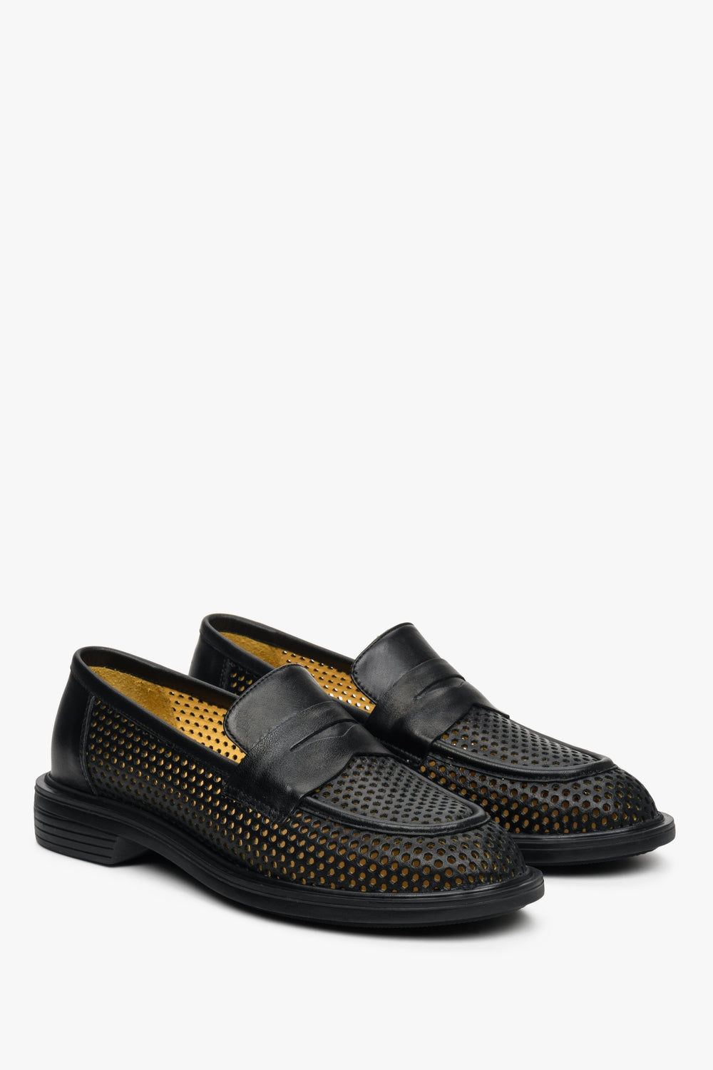 Women's black fall/spring loafers with perforation -presentation of the toe and side vamp.
