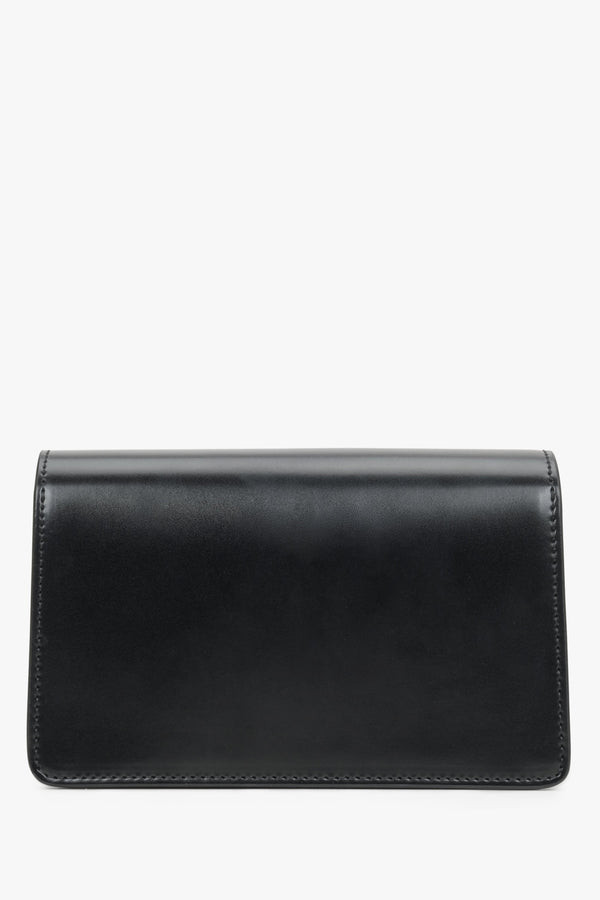 Women's small Estro bag in black - back view of the model.