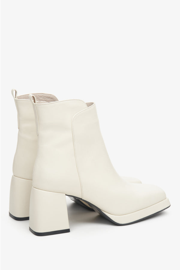 Women's beige leather Estro boots - close-up on the side line and heel.