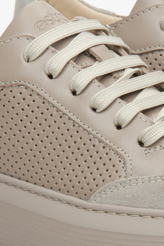 Women's beige fall sneakers with perforation, crafted from genuine leather and suede - close-up on the details.