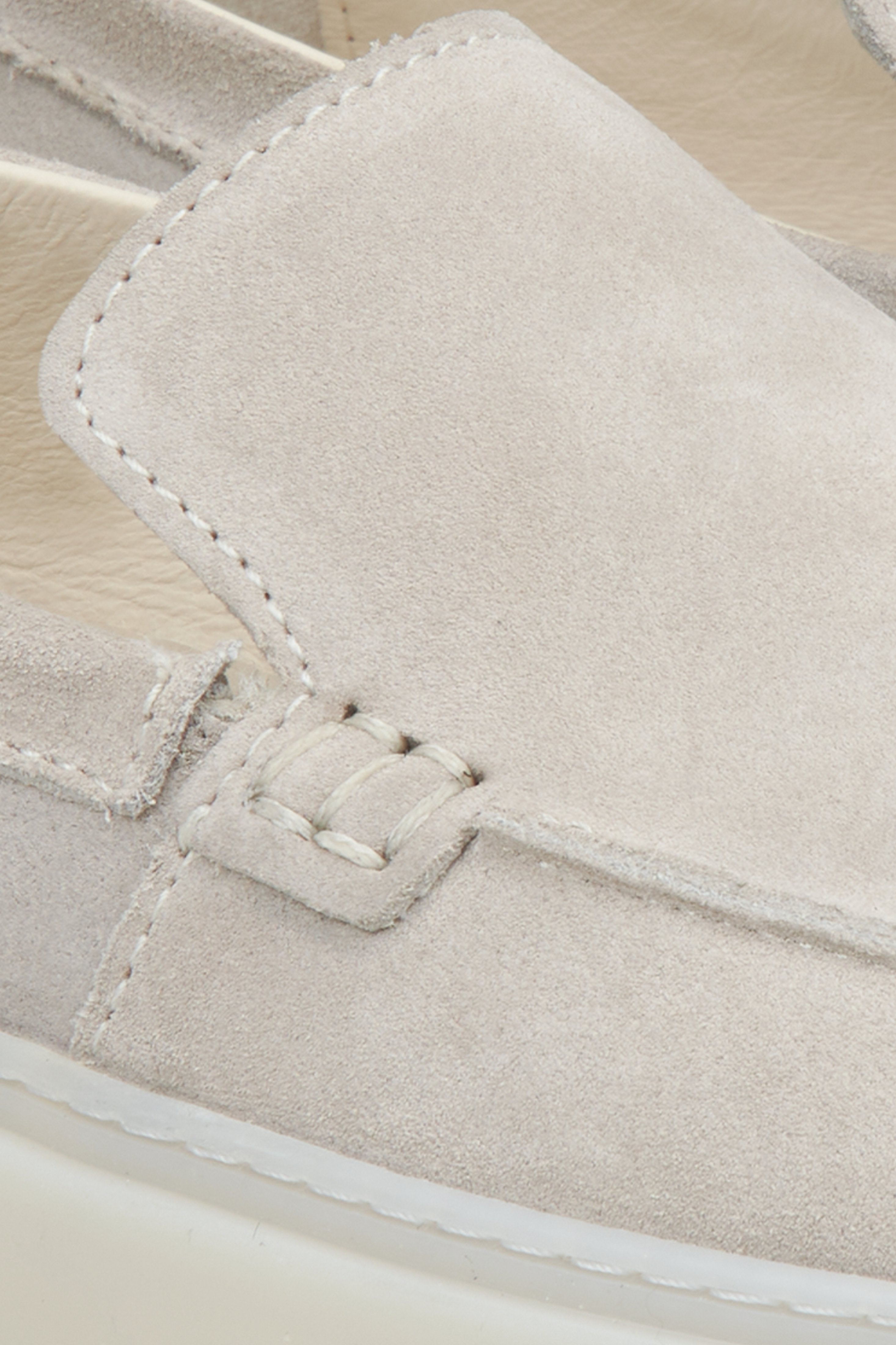 Light beige velour women's loafers - a close-up on details.