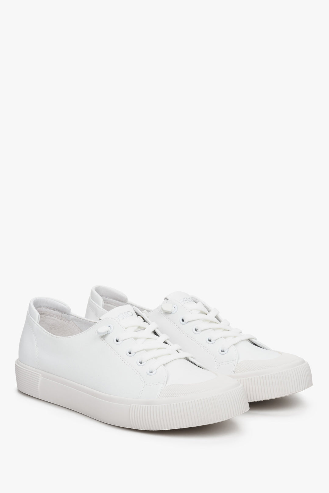 Women's white sneakers made of genuine leather by Estro, laced.