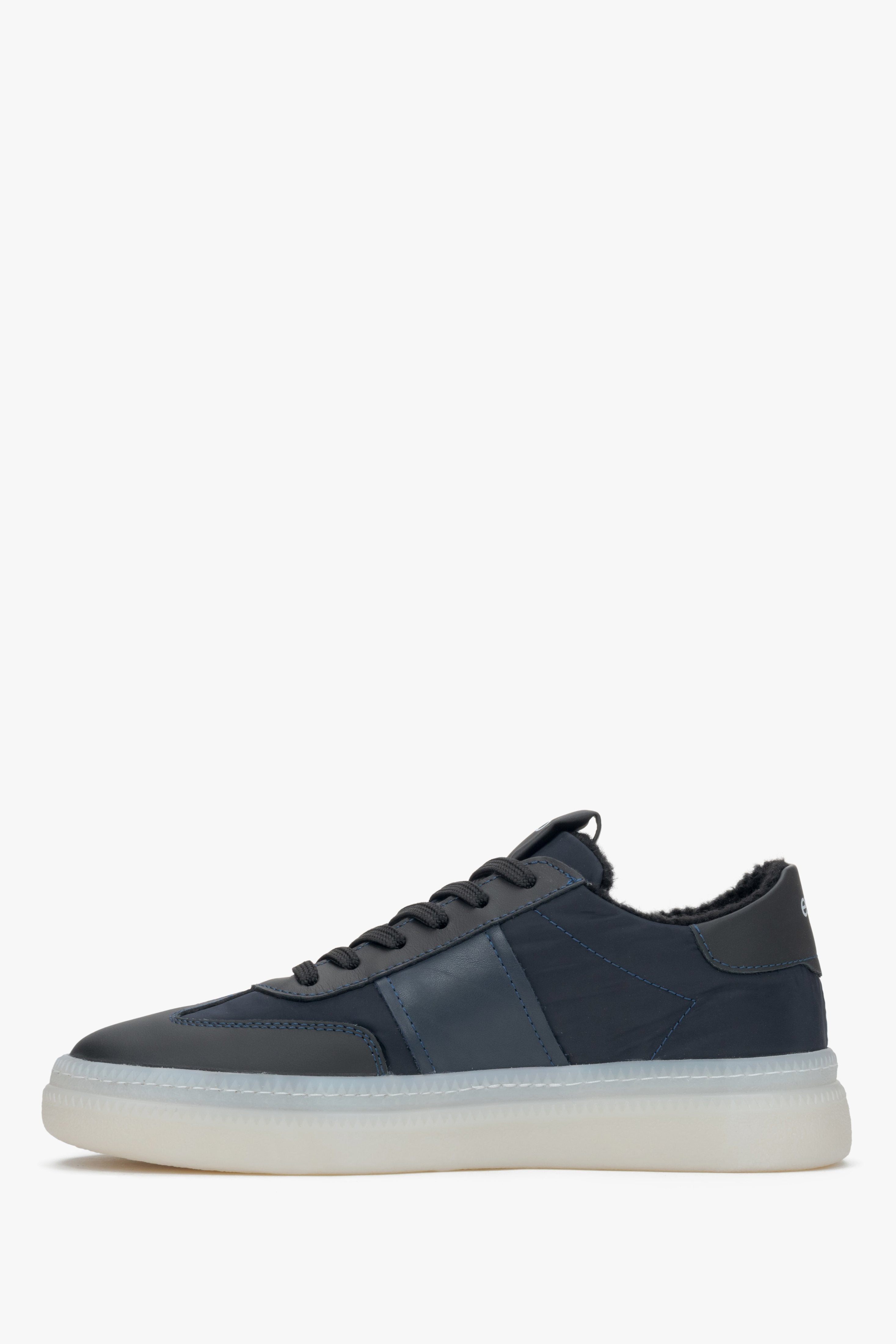 Navy blue women's leather and textile sneakers with a fur lining by Estro - side profile of the shoe.