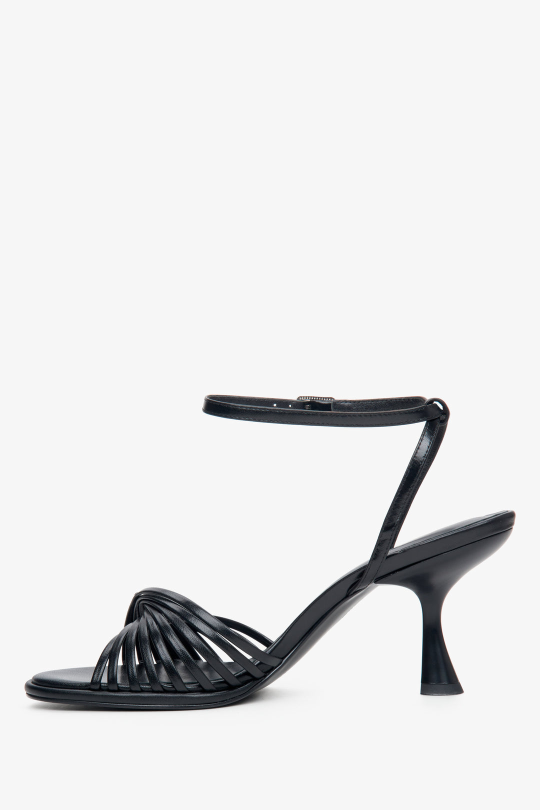 Women's leather sandals with black heels - side profile of the shoe.