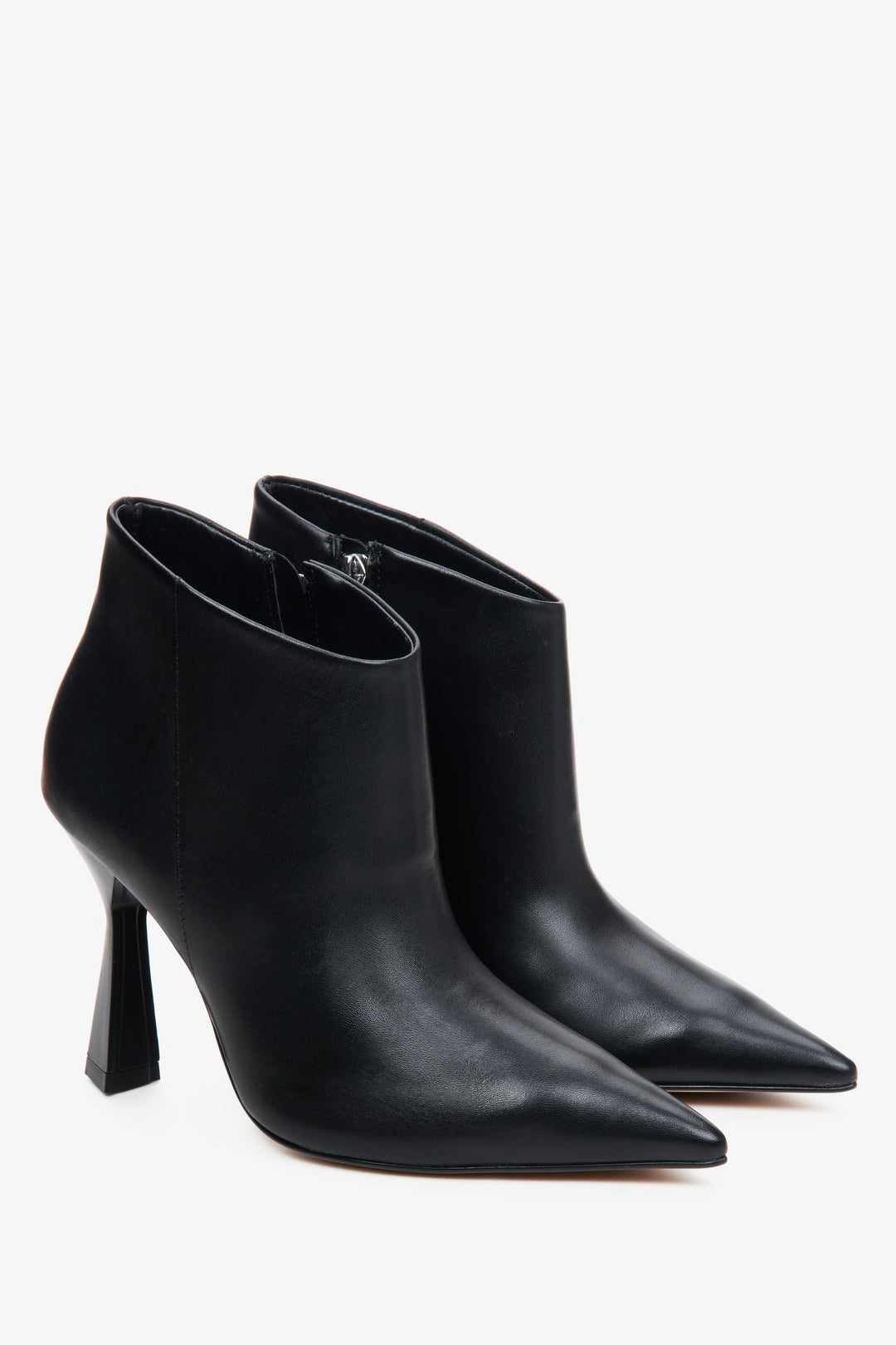 Women's black leather ankle boots by Estro with a heel.