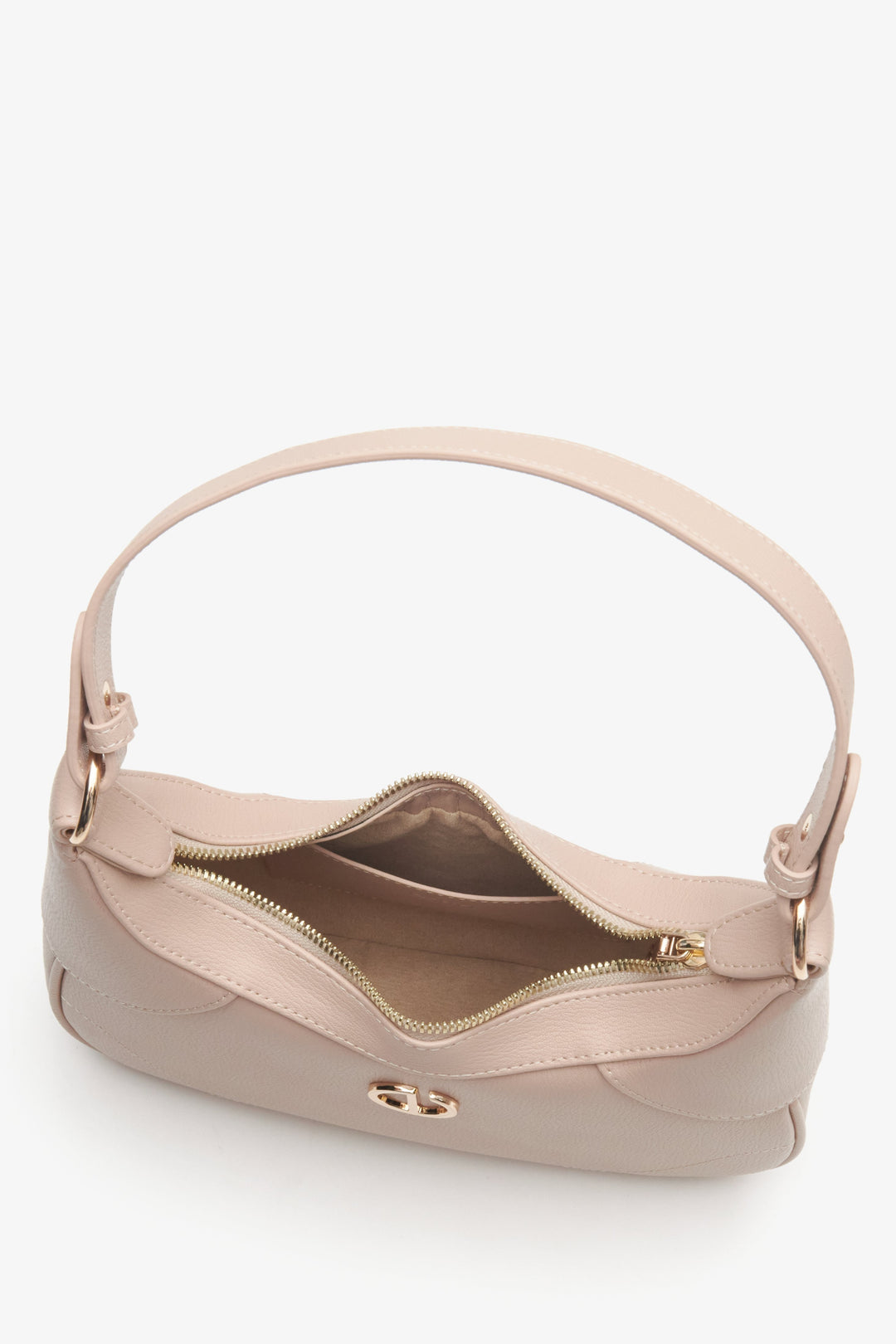 Elegant women's pale pink bag - a close-up on the main compartment.