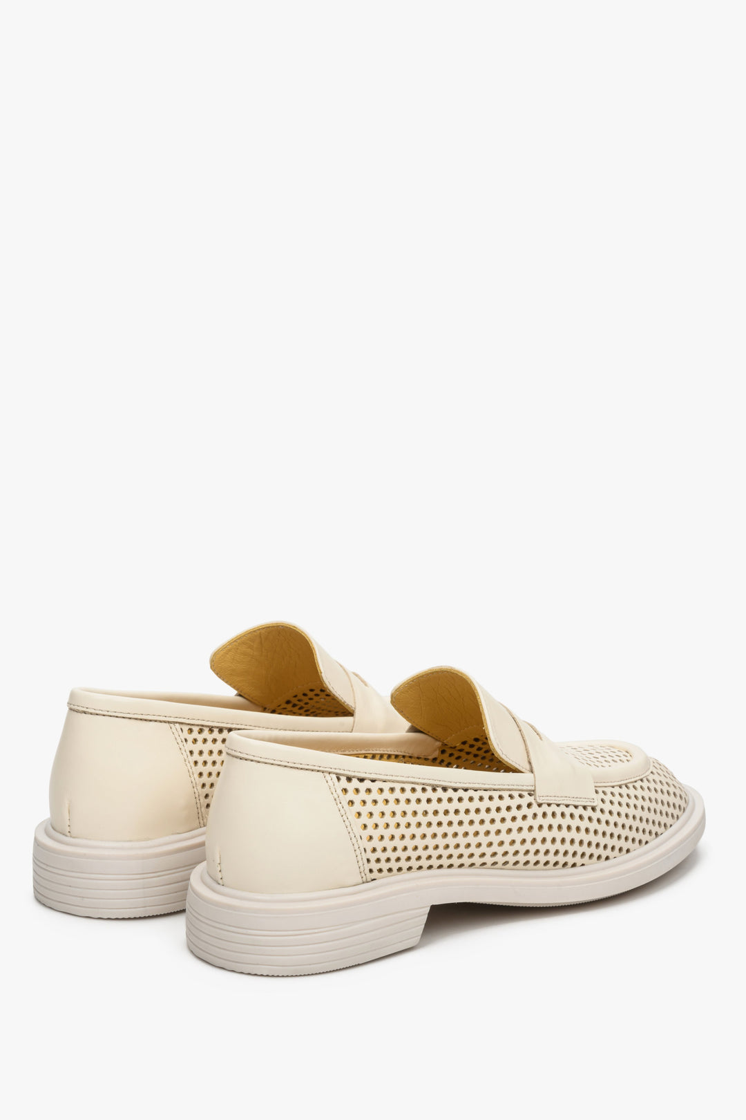 Comfortable light beige perforated women's loafers - close-up on the heel.
