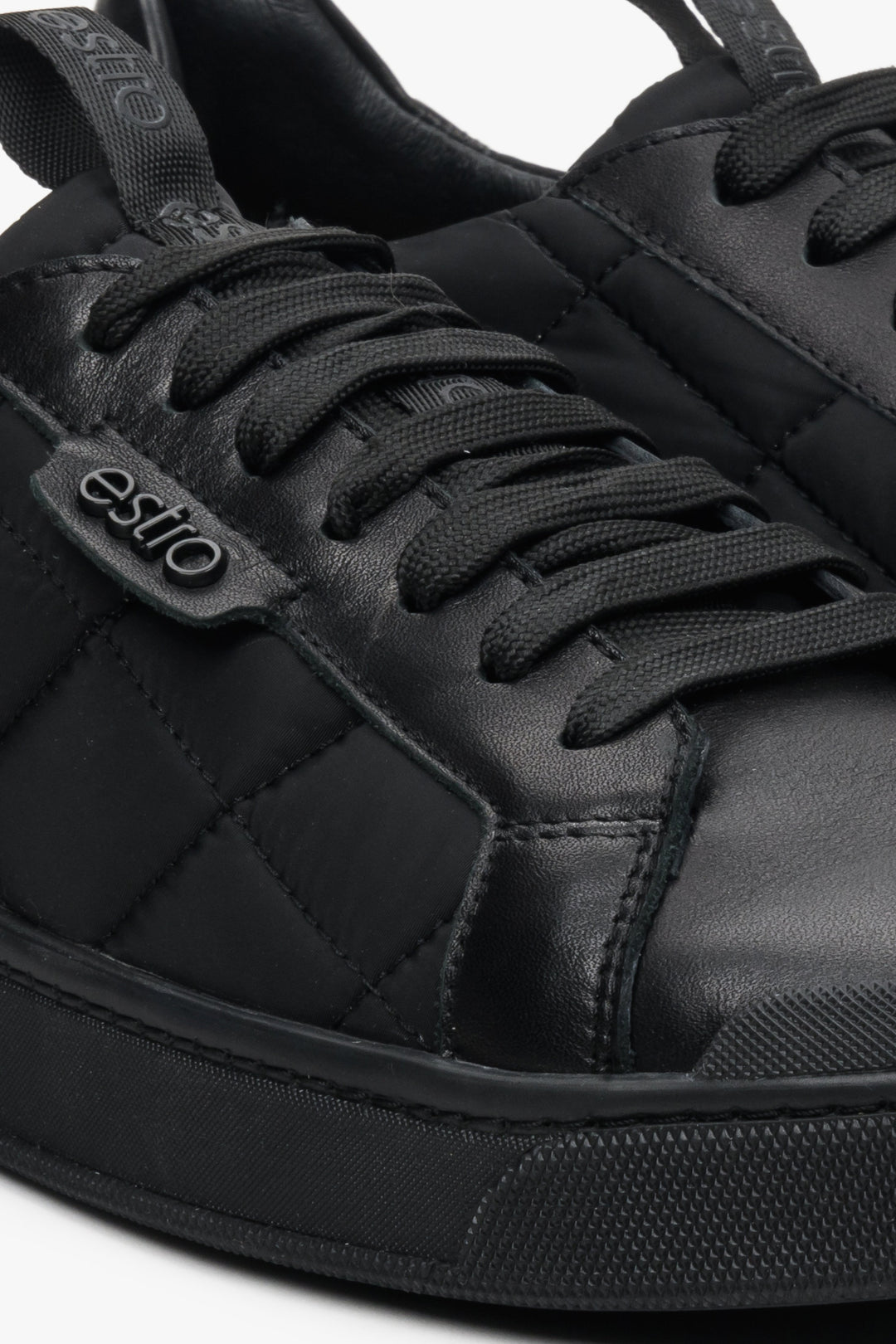 Men's black Estro sneakers for spring and autumn - a close-up of the details.