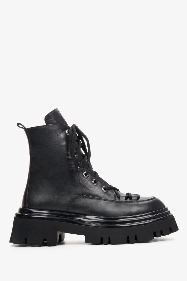 Black lace-up women's boots - shoe profile.