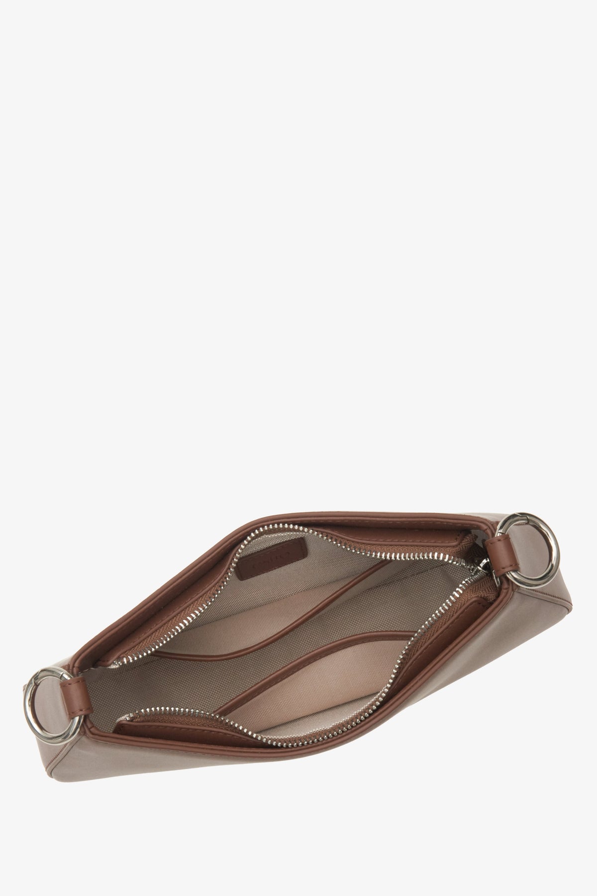 Women's brown leather bag by Estro - close-up on the interior view.