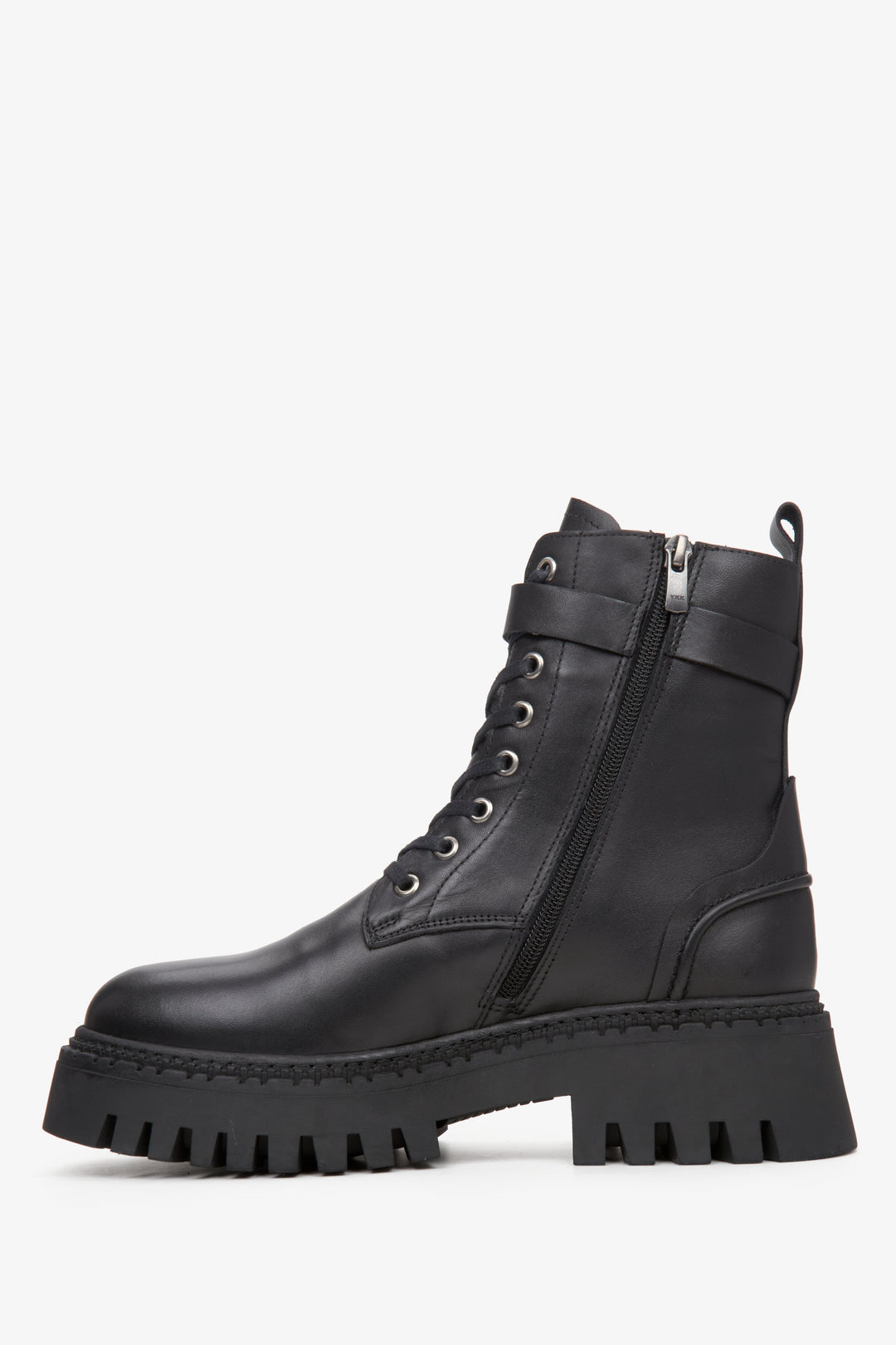 Women's black ankle boots made of genuine leather - side profile of the shoe.