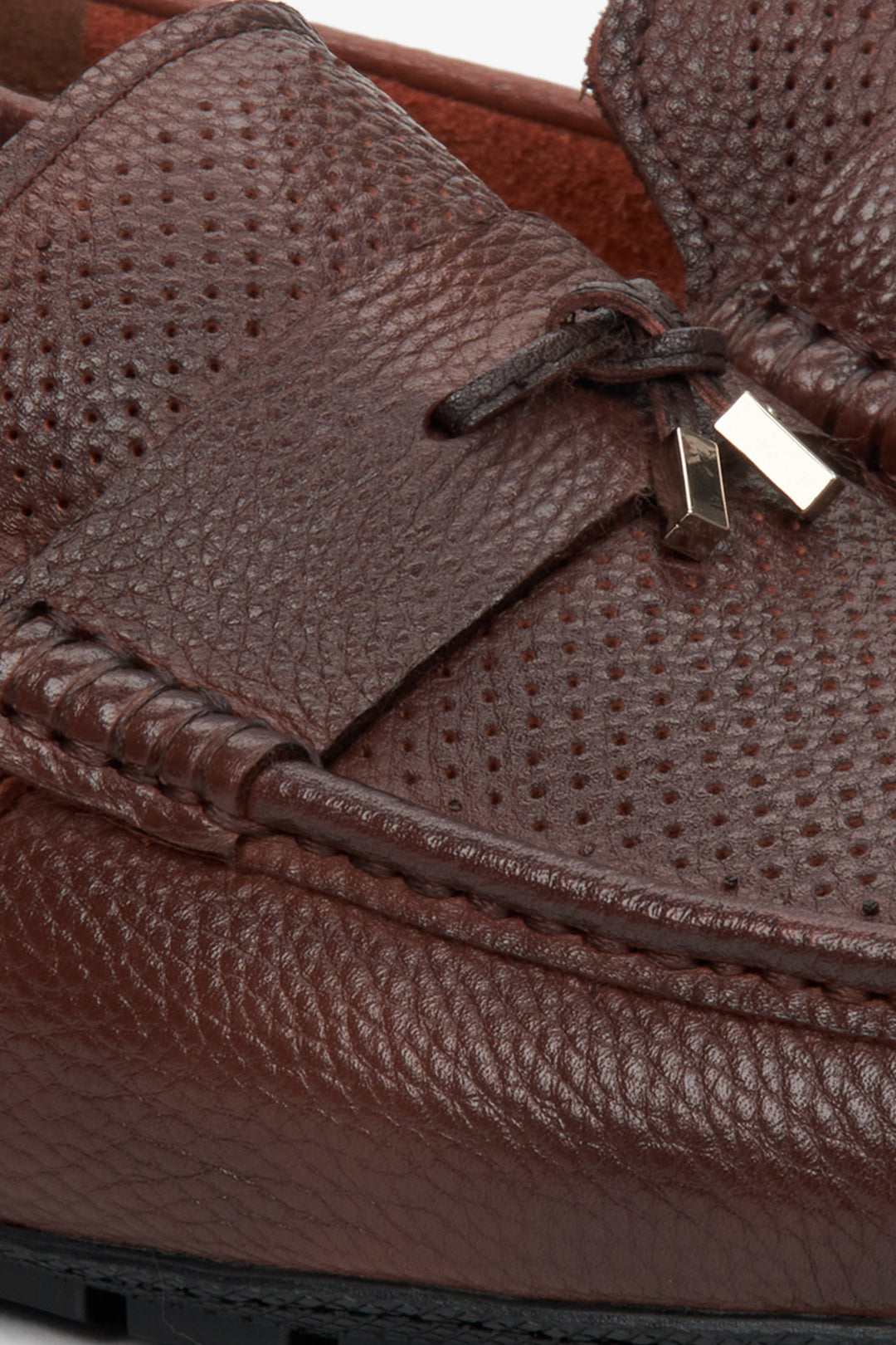 Men's brown leather loafers for fall - close-up on the details.