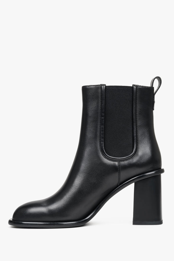 Elegant black women's ankle boots with a high, stable heel made of genuine leather by Estro.