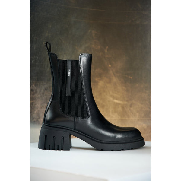 Women's black high-heeled Chelsea boots - shoe profile.