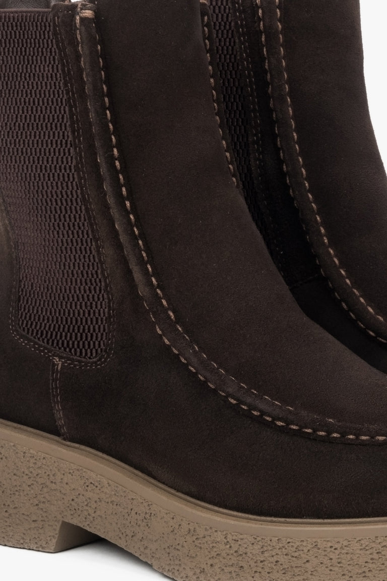 Dark brown women's chelsea boots made of velour by Estro - close-up of details.