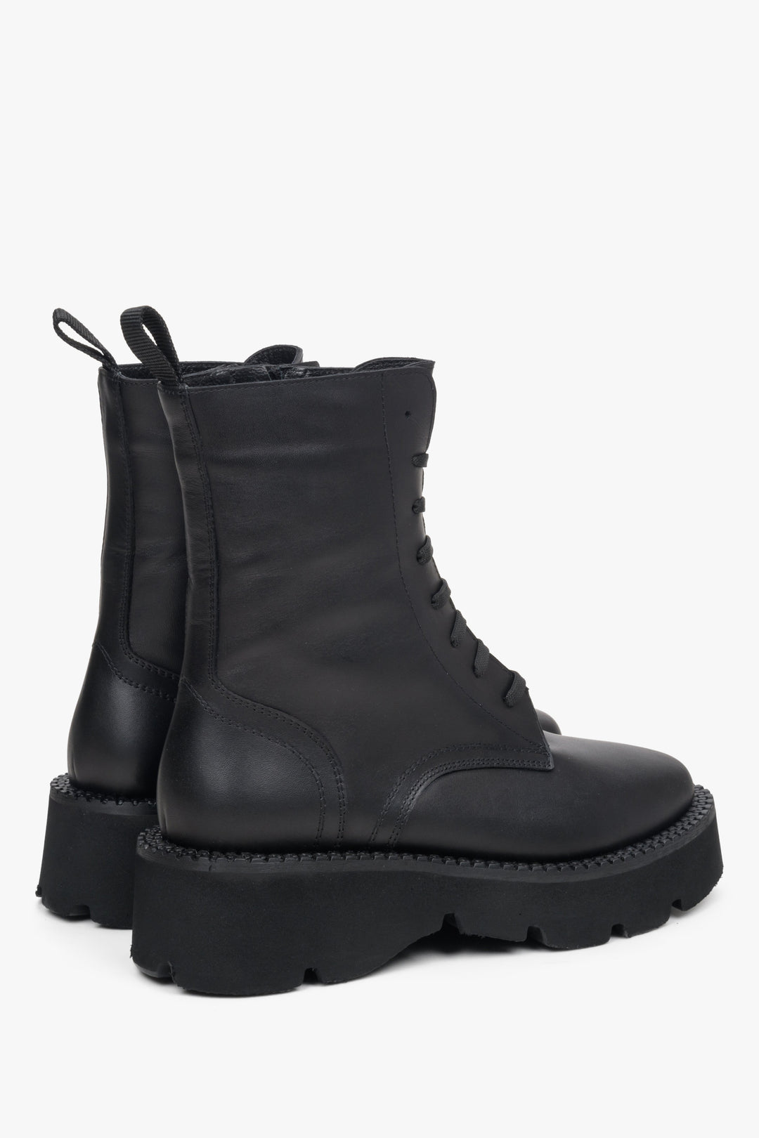 Women's black leather boots by Estro - close-up on the sole and side line of the boot.